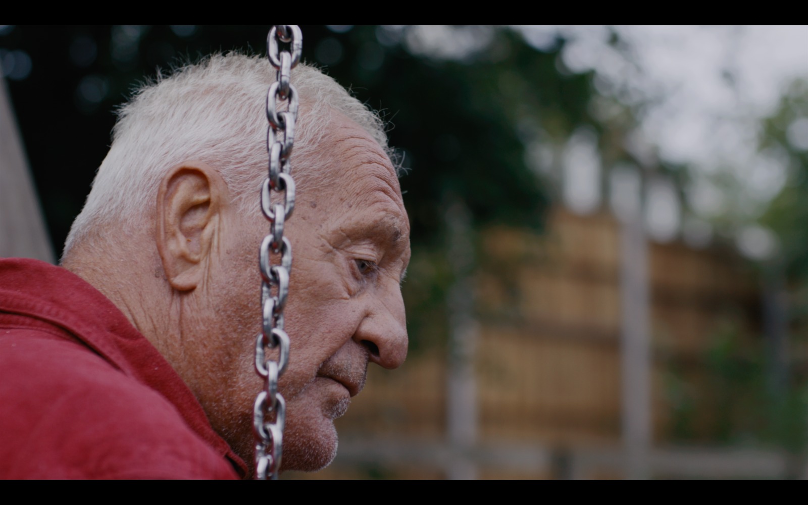 Film still — grandad in park